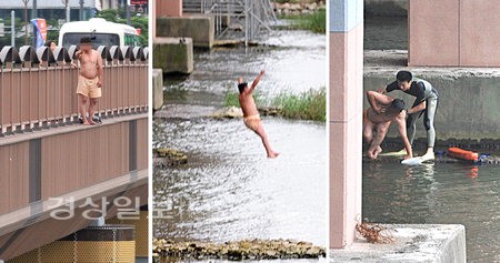 3일 태화교 위에서 자살소동을 벌이던 한 남성이 태화교 아래 태화강으로 뛰어내린 뒤 119구조대원에 의해 구조되고 있다. <br /><br />  김동수기자 dskim@ksilbo.co.kr
